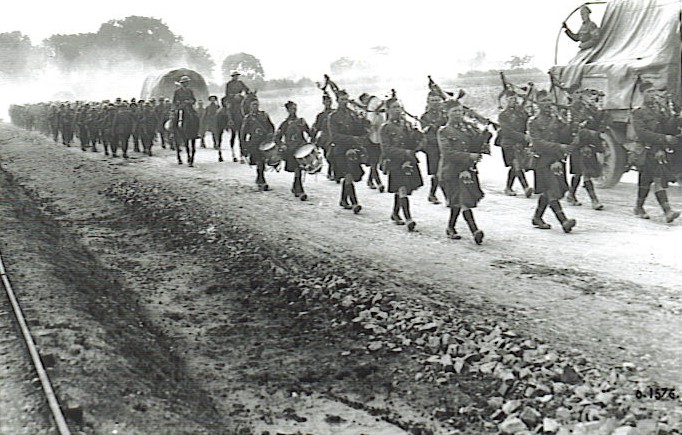 The Pipes and Drums of the 19th Battalion leading it on the march to Hill 70, August 1917.
